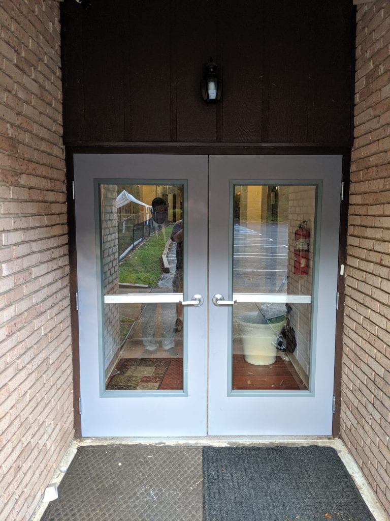 Hollow metal doors with full glass installed in Atlanta Northstar Locksmiths